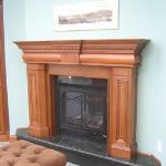 CUSTOM FIREPLACE IN CHERRY TO MATCH ADJACENT CABINETRY, HAND FINSIHED