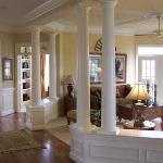 LARGE LIVING ROOM SEPERATED BY ELEGANT COLUMNS